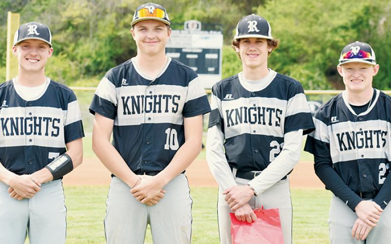Prior to Tuesday’s home game against Hayesville, the Robbinsville Black Knights recognized their four baseball seniors. From left are Alex Knight, Lathan Buchanan, Preston Phillips and Caleb Turpin. Photos by Kevin Hensley/sports@grahamstar.com