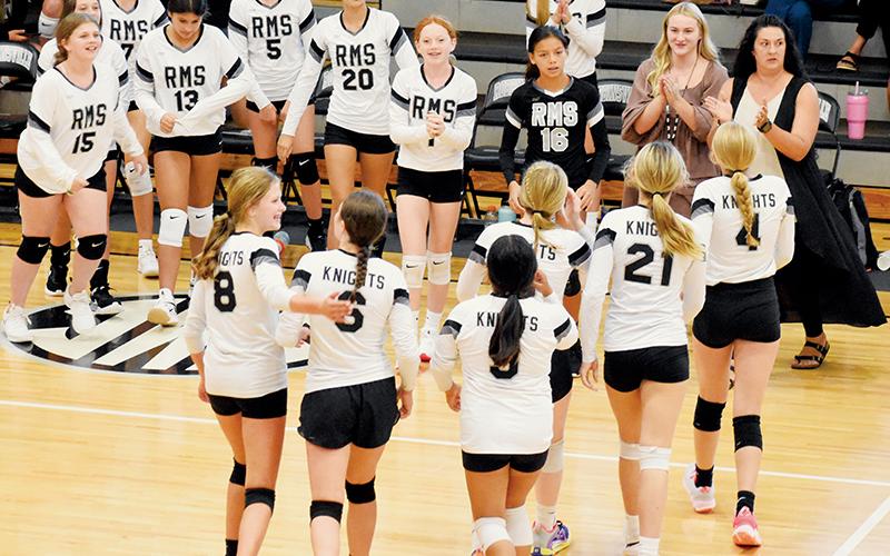 Smiles broke out all around at the conclusion of Robbinsville's 3-set, middle-school win over Hiwassee Dam/Ranger on Monday. Photo by Kevin Hensley/sports@grahamstar.com