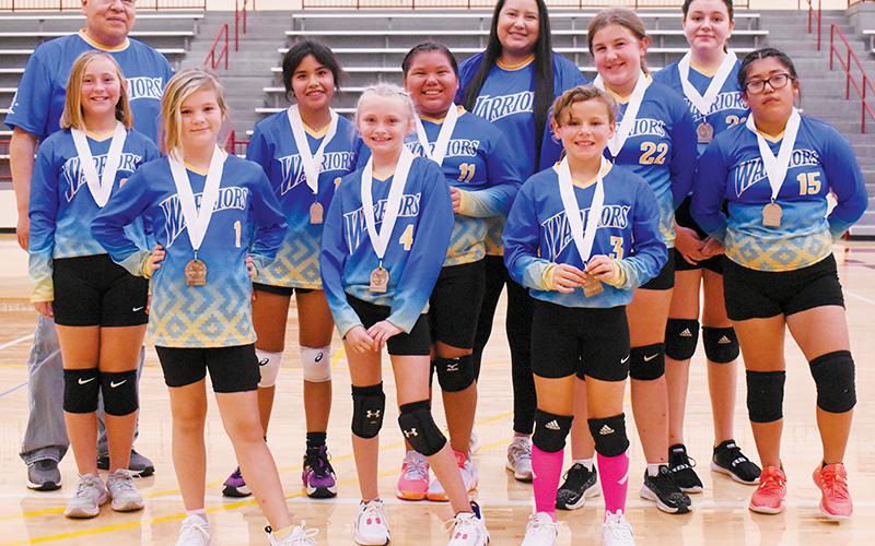 The Snowbird Lady Warriors finished as the tournament runners-up. All names are listed from left. Front row: Temperance Hyde, Ophelia Beasley and Olivia Robinson. Second row: Willoh Gill, Delilah Brown, Ty Chekeleelee, Parklynn Anderson and Jasmine Martinez. Back row: assistant coach Michael Smoker, head coach Skyler Toineeta and Estera Tent.