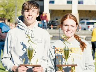 Brock Adams and Zoie Shuler were named the respective Male and Female Most Outstanding athletes of the 2023 Smoky Mountain Conference championship meet, which was held May 3 at Cherokee. Photo by Kevin Hensley/sports@grahamstar.com