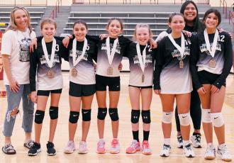 Robbinsville Black emerged as champions of the 2023 Smokey Mountain Youth Conference Volleyball Tournament, which was held Saturday at Cherokee. Robbinsville Black swept another Graham County program – Snowbird – to capture the gold. From left are assistant coach Allison Rogers, Mercy Nelms, McKynlee Adams, Natalie Swimmer, Kamry Rogers, Amiyah Collins, head coach Holly Jackson and Lexi Crisp. Photos by Kevin Hensley/sports@grahamstar.com