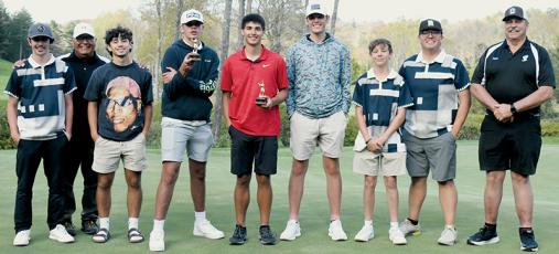 The Black Knights had not won a round of golf against the Murphy Bulldogs since Robbinsville’s last conference title in 2000. That changed Monday, with the team slicing by Murphy in the second round of the annual divisional tournament. From left are Avery Brown, assistant coach Jody Brown, Trey Lambert, Isiac Collins, Isaiah Brown, Nathanael Shope, Cody Crisp, assistant coach Jeremy Brown and head coach Kent Williams. Photo by Kevin Hensley/sports@grahamstar.com