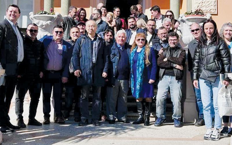 Eternal Truth Ministries President Ethan Ramsey (left) stands with the  evangelical church leaders he recently met with in Albania, to present the ministry’s disciples training.